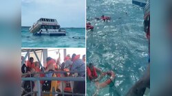VIDEO : लाटांच्या तडाख्यानंतर भरसमुद्रात उलटली प्रवाशांची बोट; पाण्यात उडी मारताच...