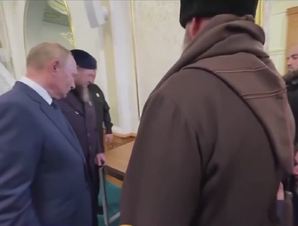 PutinKissesQuran