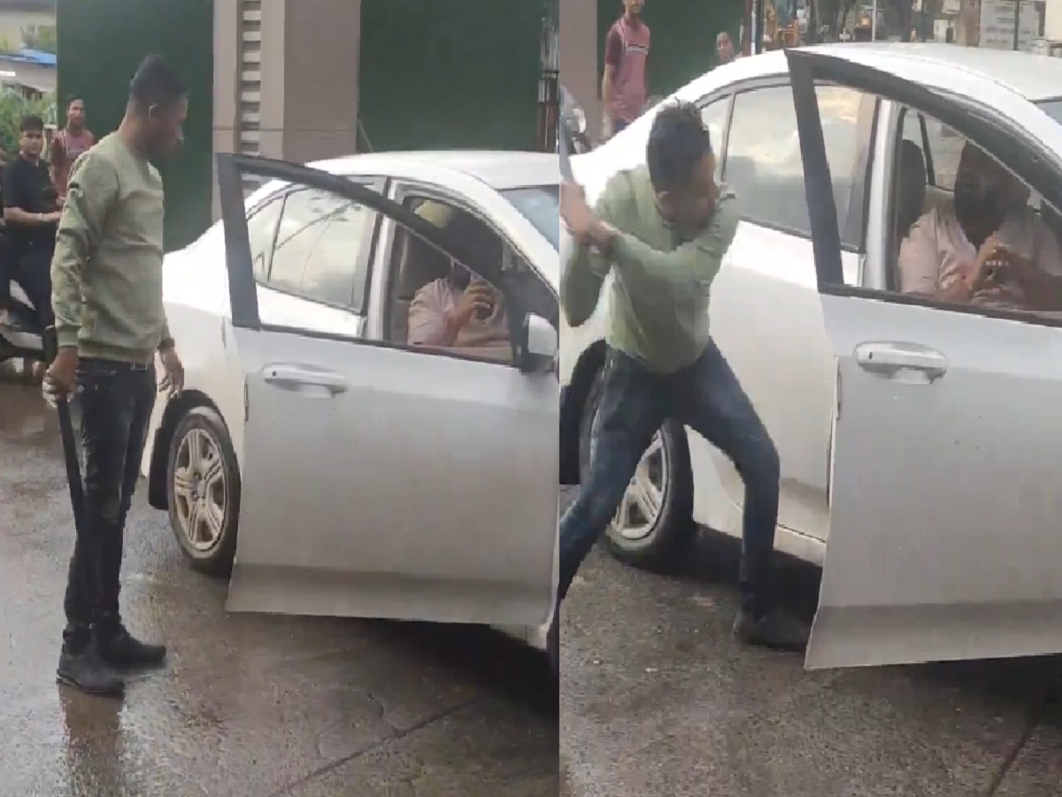 शिंदेंच्या आमदाराच्या बॉडिगार्डची दादागिरी, भर रस्त्यात केली एकाला मारहाण...Video व्हायरल शिंदेंच्या आमदाराच्या बॉडिगार्डची दादागिरी, भर रस्त्यात केली एकाला मारहाण...Video व्हायरल