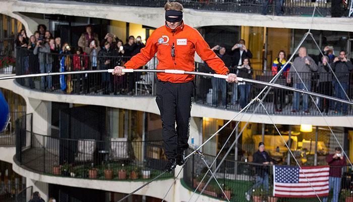 Blindfolded daredevil completes tightrope walk