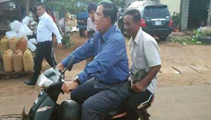 कंबोडियाच्या पंतप्रधानांना बिना हेल्मेट बाईक चालविल्याने दंड