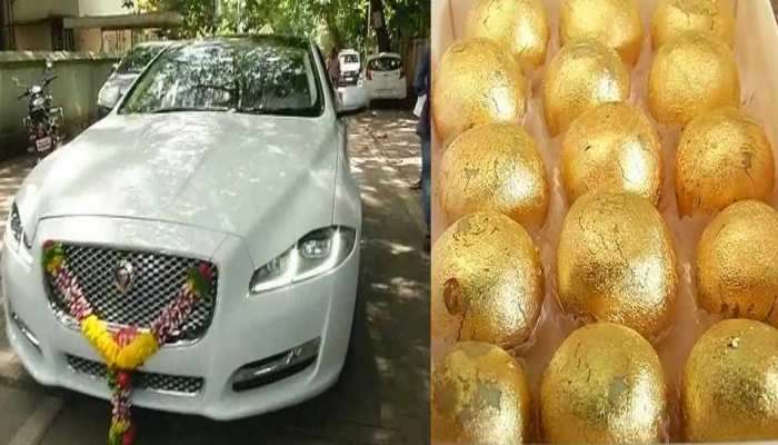 गाडी घेतल्याच्या आनंदात व्यापाऱ्यानं वाटले सोनेरी पेढे