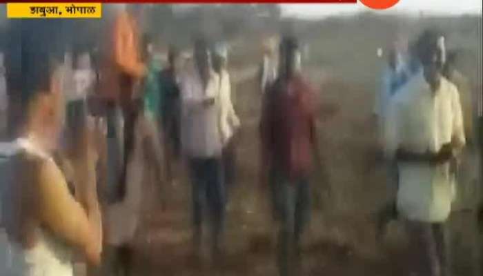 Madhya Pradesh Villagers force a women to carry husband on her shoulders as a punishment