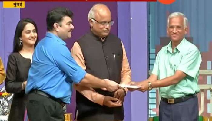 Sangharshala Havi Sath Prashant Damle gives 1 lakh rupee cheque Sangharshala Havi Sath Prashant Damle gives 1 lakh rupee cheque