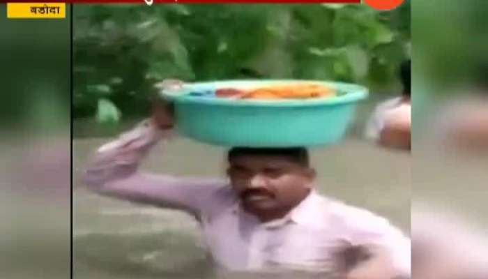 Gujrat Vadodara Cop Carries 45 Days Infant In Rescue Operation From Flood