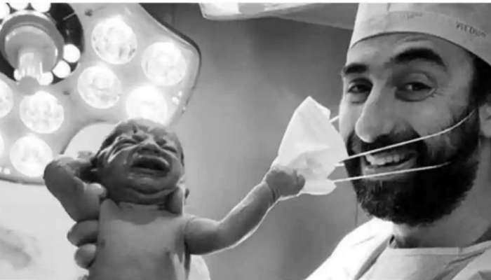 बाळाने जन्मताच काढला डॉक्टरचा मास्क, ...म्हणून फोटो होतोय व्हायरल 