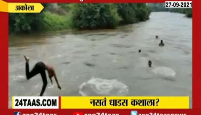 Akola Young Youth Doing Stunts By Jumping In Flooded River Putting Life At Risk