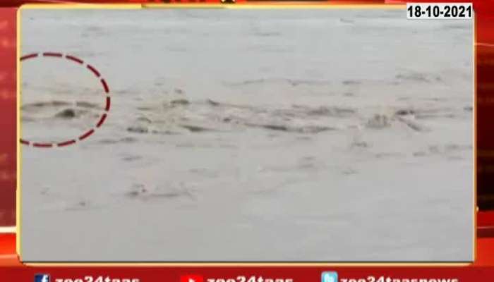 Hingoli Man In Process To Save Soyabean Get Flownaway In Flood Saved