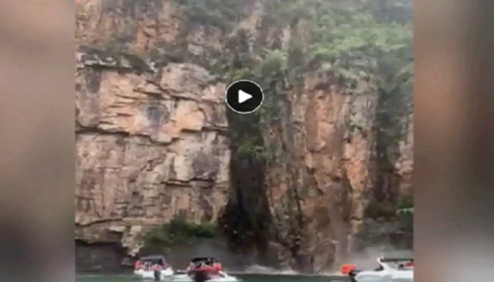 VIDEO : तलावात लुटत होते बोटिंगचा आनंद, आणि अचानक कोसळली दरड