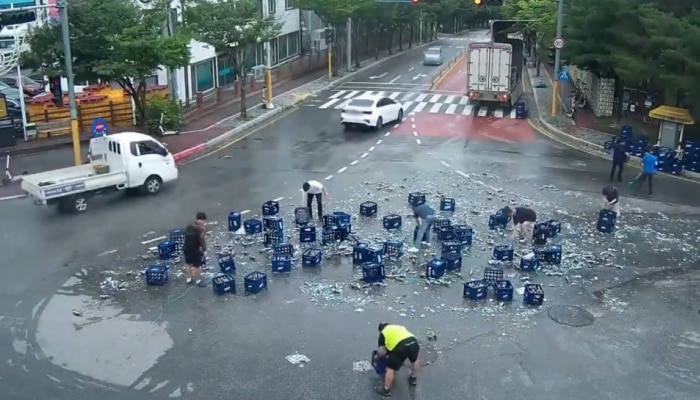 Viral Video : बॉटल्स फुटल्याने रस्त्यावर बिअरचा पूर
