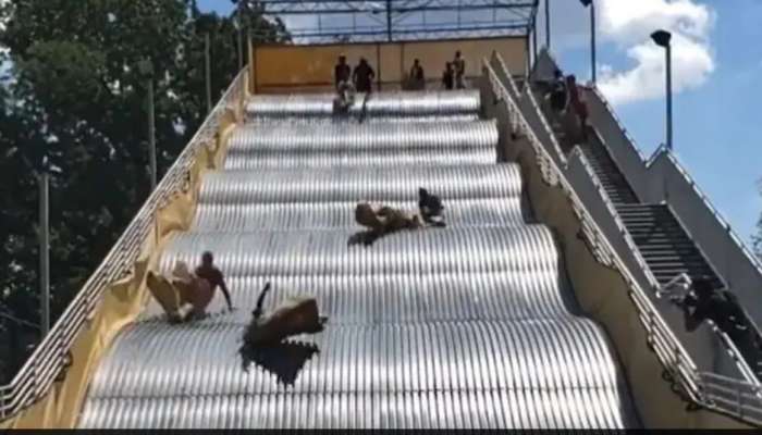 Amusement पार्कमध्ये स्लाइडचा थरार, व्हिडीओ पाहून तुम्हीही म्हणाल, 'नको रे बाबा!'