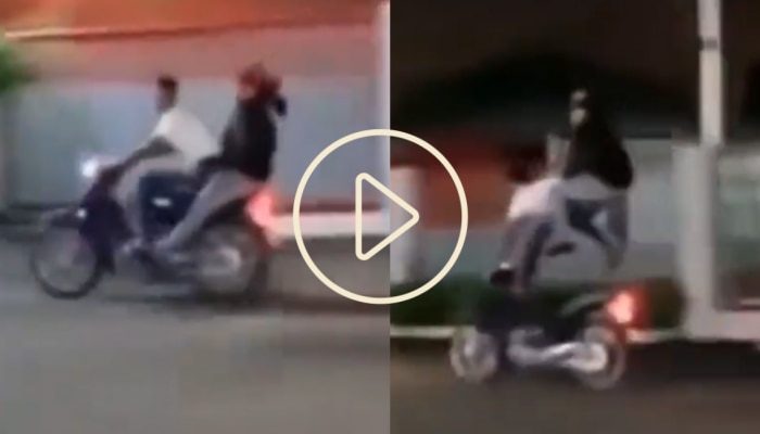 बापरे! मुलगी 4 फुट उंच उडाली, चालत्या बाईकवरून जीवघेणा स्टंट, पाहा VIDEO