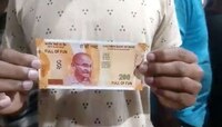 200 च्या नोटवर 'Full Of Fun'... ATM मधून निघाली कोरी करकरीत नोट!