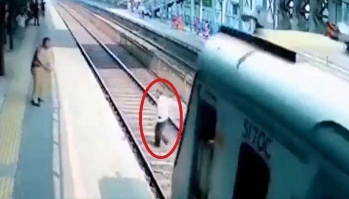 Shocking Video: रेल्वे ट्रॅक क्रॉस करतना निघालं बूट, तितक्यात ट्रेन आली आणि...