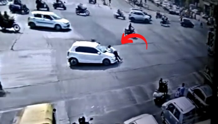 WATCH: कार चालकाची मुजोरी! वाहतूक पोलिसाला बोनेटवरुन फरफटत नेलं, घटनेचा CCTV Video समोर