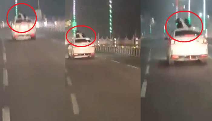 VIDEO : बाइक रोमान्सनंतर आता कारच्या रुफवर प्रेमी युगुलाचे अश्लील चाळे