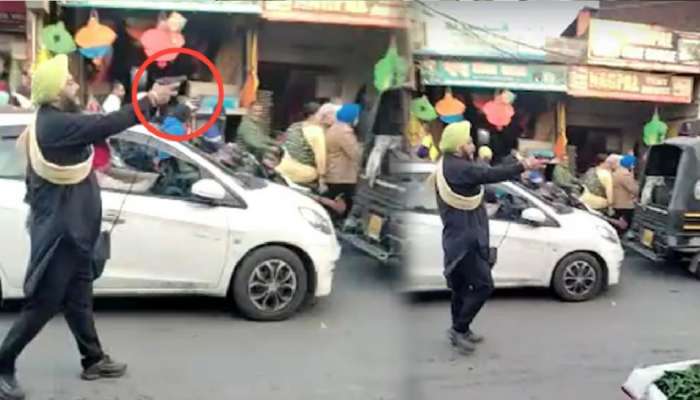 Video: Traffic Jam पाहून त्याने रस्त्याच्या मध्यभागी उभं राहून खिशातून Pistol काढली अन्...