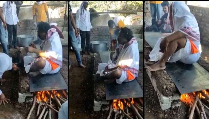 Video Viral : गरम तव्यावर बसून भक्तांना शिवीगाळ करणाऱ्या बाबा गायब; भक्तांनी केला अजब दावा