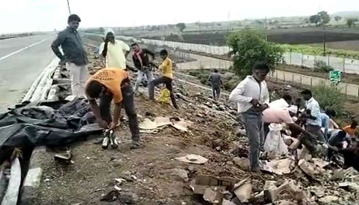 याला म्हणतात योगायोग... दारुबंदी आहे तिथेच उलटला बियरचा ट्रक; समृद्धी महामार्गावर बाटल्या गोळा करण्यासाठी गर्दी