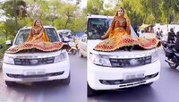 भर रस्त्यात कारच्या बोनेटवर बसून फोटोशूट, पोलिसांनी पाठवलं गिफ्ट...