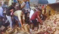 भररस्त्यात उलटला बियरने भरलेला ट्रक, लोकांनी खोऱ्याने उचलल्या बाटल्या; पाहा Video