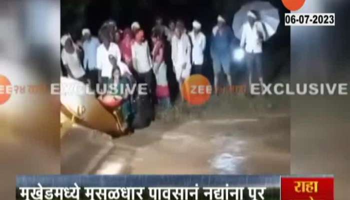 Nanded Rescue of a farmer stuck in flood with the help of JCB