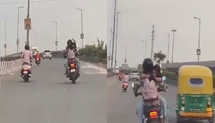 VIDEO : धावत्या बाइकवर बॉयफ्रेंडच्या मांडीवर बसून तरुणीचा रोमान्स, व्हिडीओ Viral झाल्यानंतर