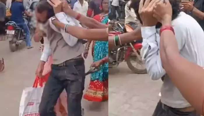 VIDEO : उपसरपंचाची तक्रार करणाऱ्या तरुणाला मारहाण, महिलांनी काढली धिंड