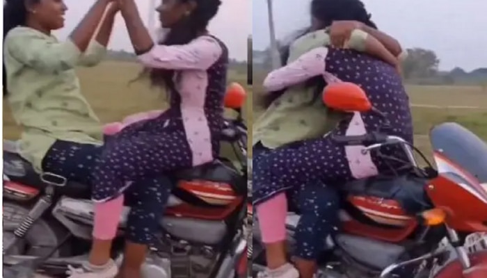 धावत्या बाईकवर दोन तरुणींचे अश्लील चाळे, liplock करतानाचा Video Viral