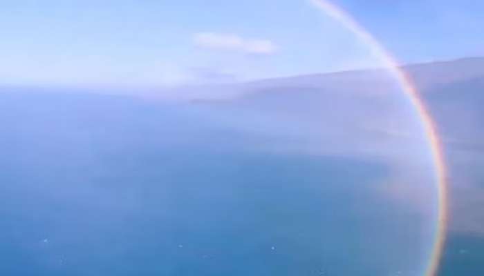 Trending News, weird news, viral trending news, off beat news viral video, social media viral videos, full rainbow, rainbow from height, rainbow from helicopter, rainbow from sky