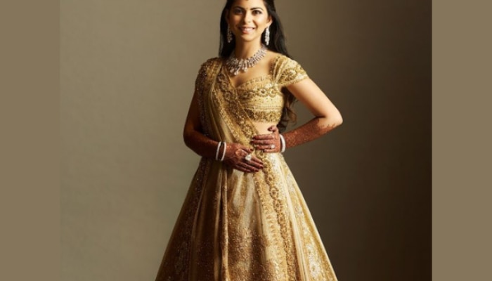 Isha ambani wedding lehenga cost Marathi News
