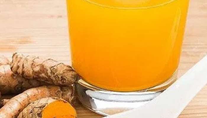 Benefits of drinking a glass of lukewarm water mixed with a pinch of turmeric 